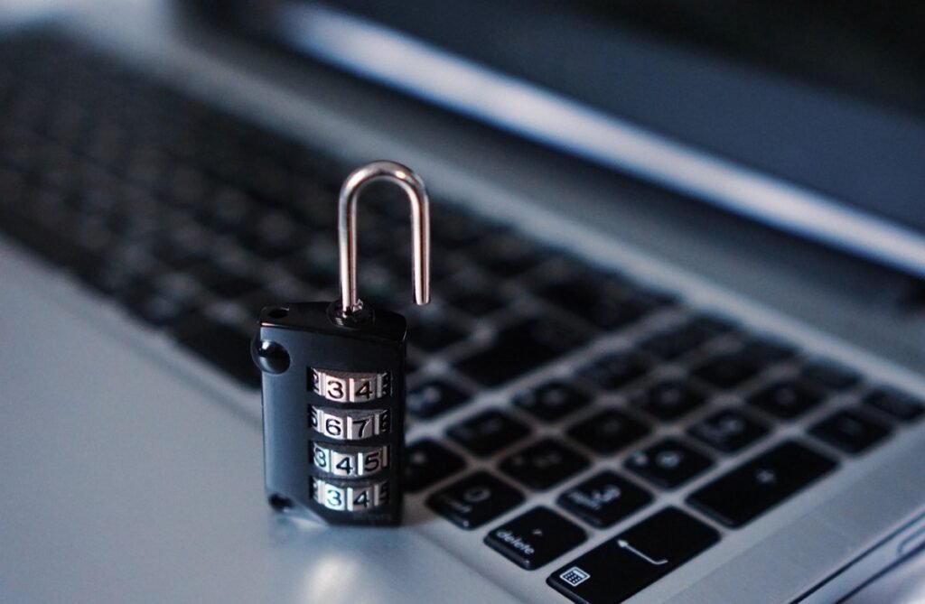 Padlock resting on a laptop keyboard